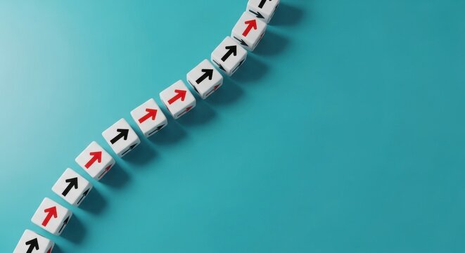 A line of white dice with red and black arrows pointing upwards on a turquoise background