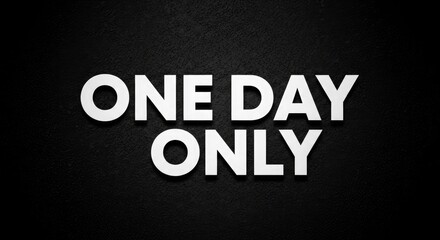 White Text " ONEDAYONLY" On Textured Black Surface