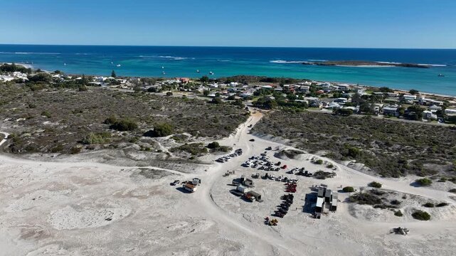 Aerial view of Beacon Road reveals a stunning contrast between the azure waters and sandy dunes, Lancelin, Western Australia, Australia.