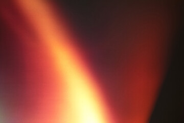 light leak overlay effect with blur red light leaks,retro noisy film texture light leak flare on black background,grunge old film burn texture with ray,abstract background with orange bright light