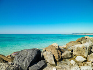 Stones on beach in Vada, Italy.