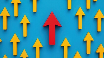 Red arrow pointing up among yellow arrows on blue background