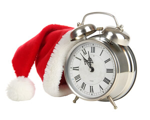 Retro alarm clock wearing a santa hat, isolated on transparent background