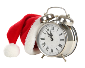 Retro alarm clock wearing a santa hat, isolated on transparent background