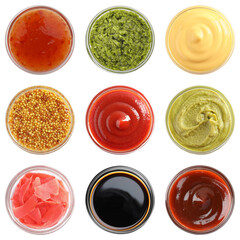 Various condiments in bowls isolated on white, set. Top view