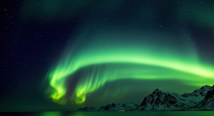 Naklejka premium Vibrant green Aurora Borealis display over snow-capped mountains and reflective water under a starry night sky.