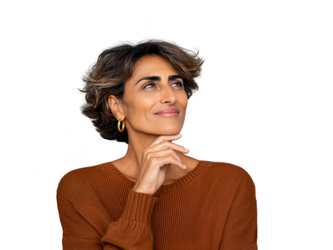 Confident middle aged woman with short wavy hair wearing brown sweater and gold hoop earring looking up with thoughtful expression isolated on transparent background