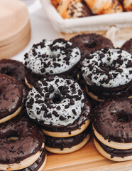 Set of coffee break in the hotel during conference meeting, with tea and coffee catering, decorated catering banquet table with variety of different pastry and bakery, with croissants, pie and cookies