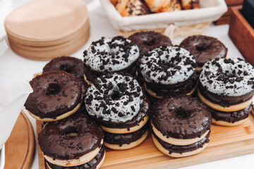 Set of coffee break in the hotel during conference meeting, with tea and coffee catering, decorated catering banquet table with variety of different pastry and bakery, with croissants, pie and cookies