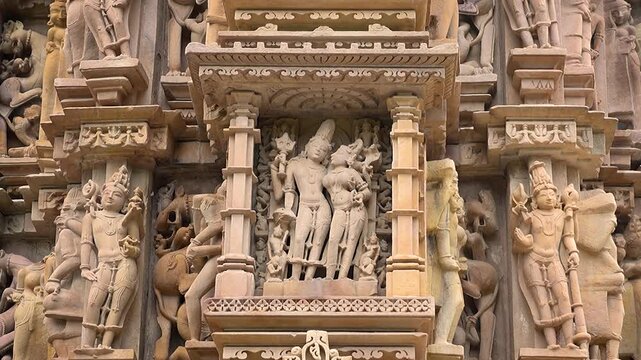 Beautiful stone sculptures at the temple, within the Khajuraho Group of Monuments in the Chhatarpur district, Madhya Pradesh, India, Asia its an a UNESCO World Heritage Site.