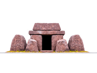 Ancient stone monument prehistoric tomb large rocks grass historical site mysterious outdoors old architecture heritage Ancient stone monument with large rocks and grass representing prehistoric