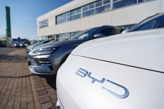 Dusseldorf, Germany - September 28 2025: Chinese automaker company BYD logo badge on a front of a car outside of a dealership
