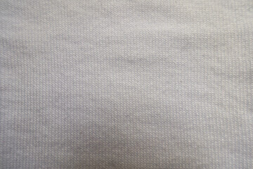 Macro of simple white cotton jersey fabric