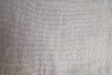Obraz premium Top view of simple white cotton jersey fabric