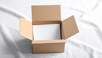 Half Open Cardboard Box on Fabric Background