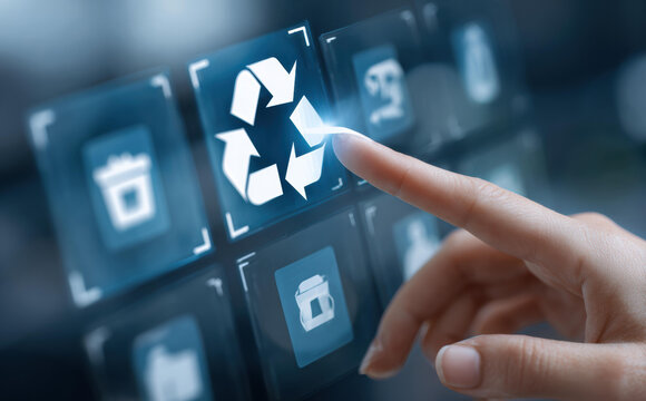 Finger touching glowing recycling icon on digital screen. sustainability and environment concept illustrates future of technology and waste management choice