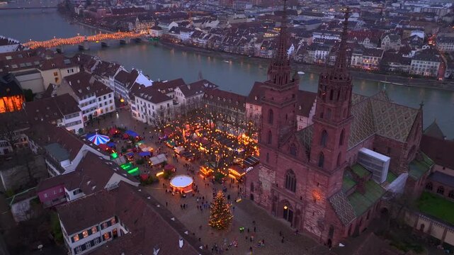 Basel Christmas Market Aerial Shot. Illuminated Basler Weihnachtsmarkt in the evening Twilights at Winter in Switzerland