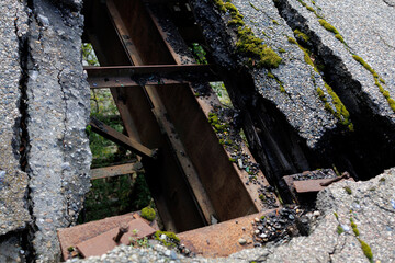 An old, destroyed road on a bridge