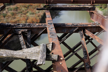 An old, destroyed road on a bridge