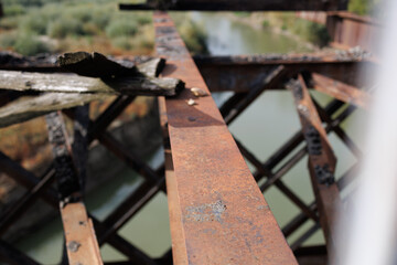 An old, destroyed road on a bridge