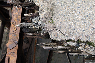 An old, destroyed road on a bridge