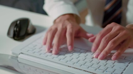 Close up top view of man hands typing on laptop keyboard. Rotating shot showing work, coding, office, remote work, or digital productivity concept with professional focus. - Powered by Adobe