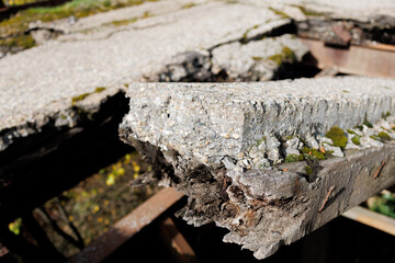 An old, destroyed road on a bridge