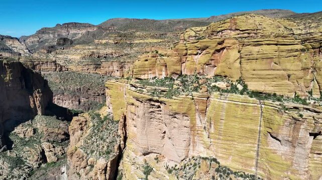 Aerial view of the rugged Apache Trail, showcasing the canyon's depth and the stark beauty of the Arizona landscape, Apache Junction, Arizona, United States.