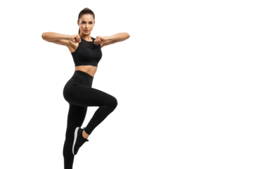 A woman in a black sports bra and leggings striking a pose with her fists raised, against transparent background