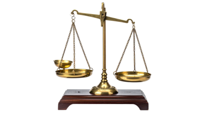 Brass scales slightly tilted, atop a dark wood base