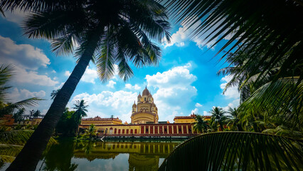 Evening View of Dakshineswar Kali Temple with Lights Reflecting on the Ganges River