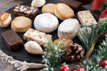 Traditional Spanish Christmas sweets assortment on wooden table