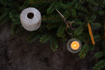 Top view of crochet tools and yarn in a basket on rustic wooden table. Cozy handmade workspace...