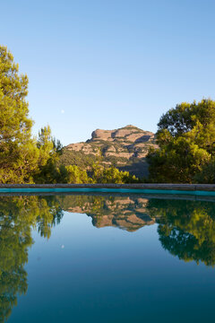 Serene rural landscape with mountain reflection