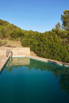 Tranquil pool setting amidst lush countryside