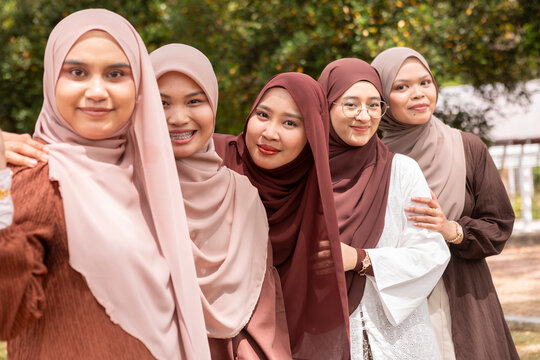 Young Muslim friends enjoy time together outdoors