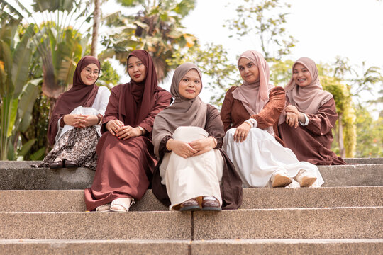 Muslim friends enjoying time together in the park
