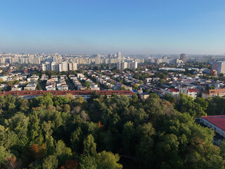 Obraz premium Aerial view of a neighborhood of Bucharest on a misty morning.