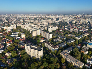 Aerial view of a neighborhood of Bucharest on a misty morning.
