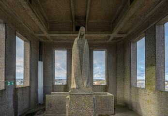 Blois, France - 10 27 2025: Detail view of the first statue of Our Lady of the Trinity in the bell...