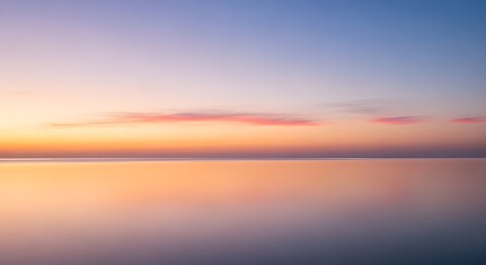 Obraz premium Serene Horizon Sunrise Over Calm Water