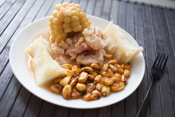 Peruvian traditional dish.fish ceviche with yuka and corn