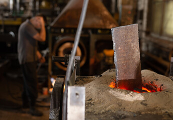 Foundry - ferrous metal is melted in an induction furnace of metallurgical plant