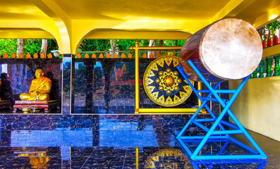 Suwankeereewong Temple golden Buddha statue statues sculpture sculptures Phuket Thailand.