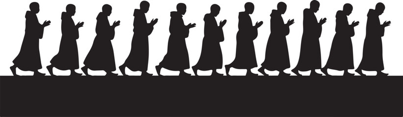 Silhouette of monks walking in procession with hands clasped religion