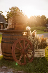 Rustic wagon wheel with flowers and basket