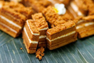 Honey cake slices on banana leaf