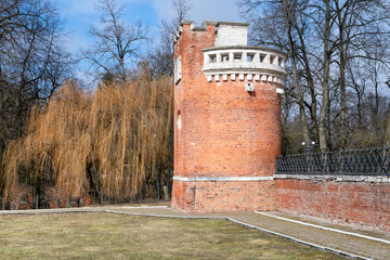 MARFINO, Moscow Region, Russia - March 28, 2024: Ancient gates with a gatehouse in the Gothic style of the manor Marfino