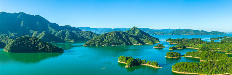 Aerial view of the beautiful lake and green mountain natural landscape in morning. Famous Qiandao Lake scenery in Hangzhou, China.