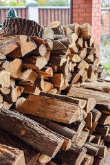 Preparing firewood for the winter. Oak timber.  Heating with the wood.